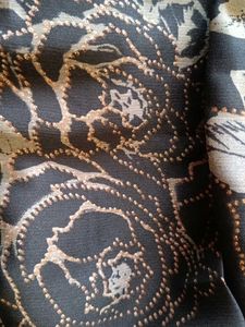 black golden and red colour saree