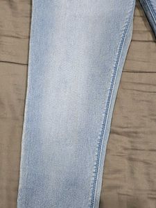 Light Wash Skinny Jeans with Zip Detail