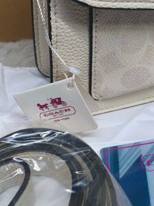Coach Tabby Off White with c print.