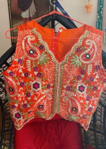Flowing Orange Ethnic Skirt with choli and jacket