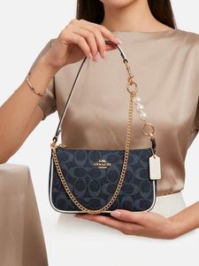 Coach Monogram Mini Bag with Pearls