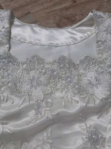 Elegant White Embroidered Blouse