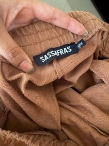 Brown Wide-Leg Pants with Abstract Face Art