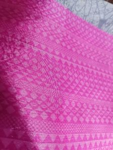 Vibrant Pink Saree with Intricate Pattern