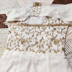 Elegant White Kurta Set with Gold Embroidery