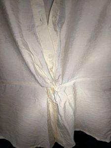 Sleeveless Twist Front Shirt