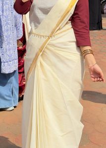 Elegant Off-White Saree with Gold Border and also