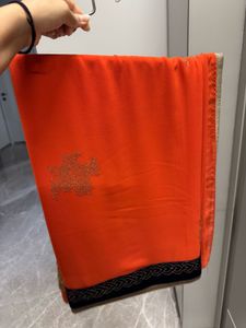Vibrant Orange Embellished Saree with velvet blous