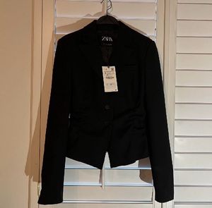 Zara gathered blazer with slit arm.