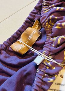 Elegant off shoulder dhoti and top set