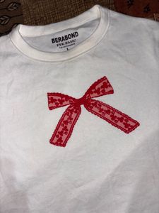 White T-Shirt with Red Bow Detail