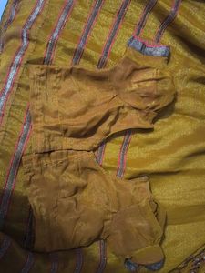 Elegant mustard heavy party wear saree with blouse