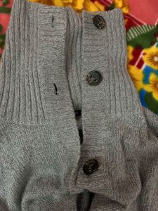 Gray Knit Cardigan Has Pocket Of Both Sides