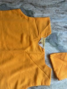 Orange Top With Tag