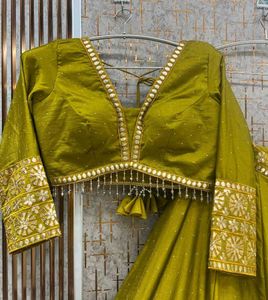 Beautiful Olive Green Embroidered Lehenga Choli