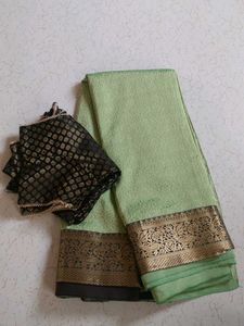 Elegant Light Green Saree with Black Blouse