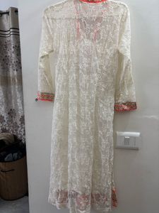 Elegant White Lace Kurta with Orange Embroidery