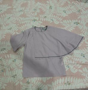 Elegant new rareism top