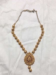 Gold neck piece