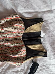 Peplum Top with Geometric Print