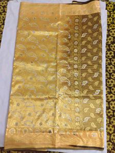 Beautiful Golden Saree with Paisley Motifs