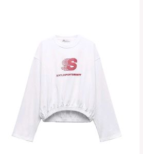 White 'Seattle' Long Sleeve Top from Zara.