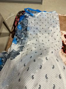 White saree with blue floral design beautifully ca