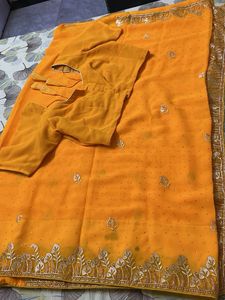 Elegant Yellow Embellished Saree