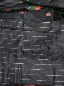 Elegant Black Saree with Intricate Peacock Motifs