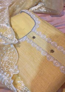 Elegant Yellow Kurta Set with Lace Detail