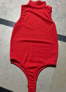 Sleeveless Red Turtleneck Bodysuit