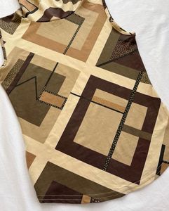 Abstract Print Sleeveless Turtleneck Top