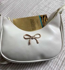 Chic White Hobo Bag with Bow Accent
