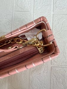 Peach stripped box sling bag