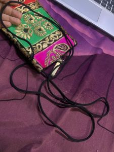 Mobile Carrying Purse With Sling