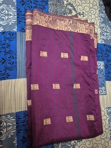 Elegant Purple Saree with Gold Motifs