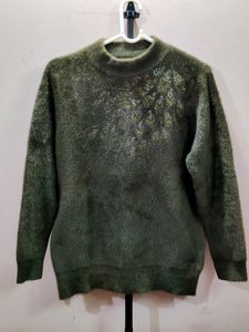 Imported women's fuzzy knit sweater with a high ne