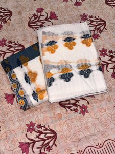 Elegant White Saree with Blue &amp; Yellow Motifs