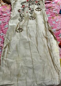 Elegant Beige Kurta with Red Accents