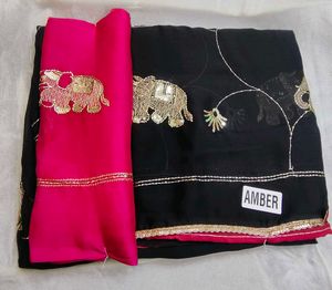 Elegant Black Saree with Elephant Motif