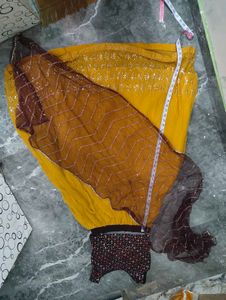 Stunning Yellow Lehenga Choli with Embellished Top