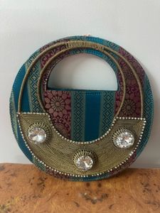 Circular Clutch with Embellishments