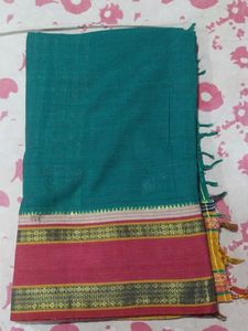 Dark green & maroon Saree with golden  peacock