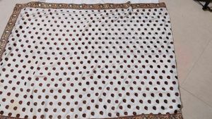 Elegant White Saree with Brown Motifs