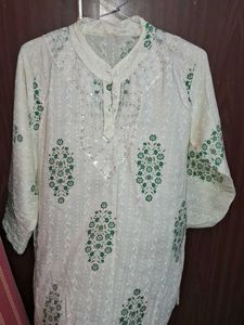 Elegant White short Kurta with Green Floral Print