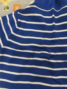 A casual navy blue striped crop top