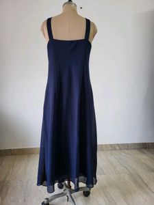 Elegant Blue Gown with Embellished Jacket