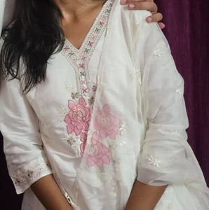 a beautiful white kurta set
