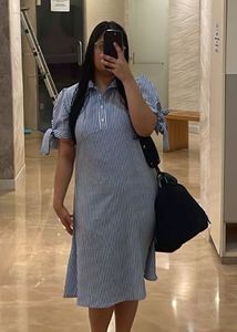 Blue and White Striped Button-Up Shirt