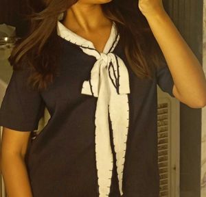 Chic Navy Top with Bow Detail